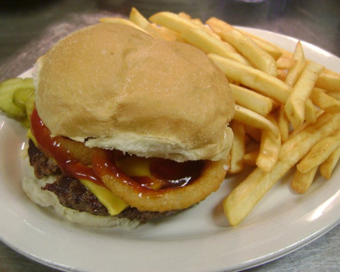 Burger with onion ring, at The Peshtigo Corral.